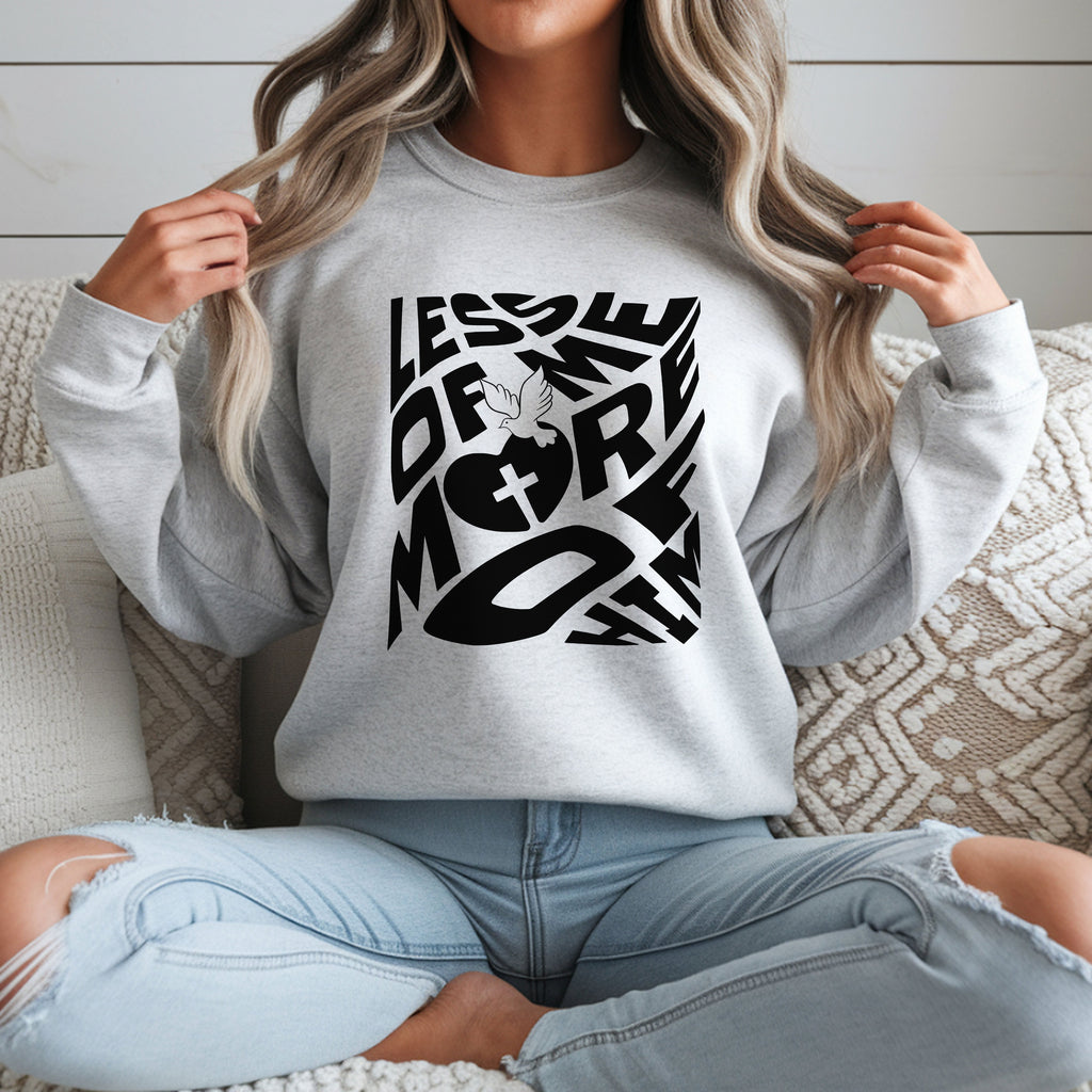 Cozy Unisex Heavy Blend™ Crewneck Sweatshirt featuring a 'Less of Me, More of Him' religious quote